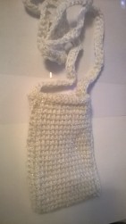 Color: White with silver glitter thread throughout. Purse/Cell phone holder. Smaller phones.